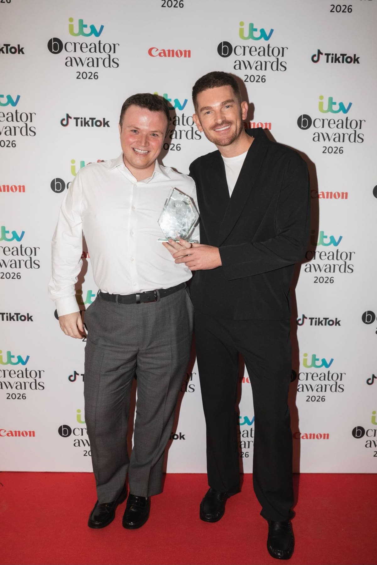 Liam Brown and Adam Frisby with an award at the ITV bCreator Awards