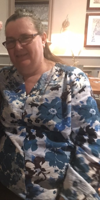 Jenny Longden in a blue floral top in the supplied before photograph.